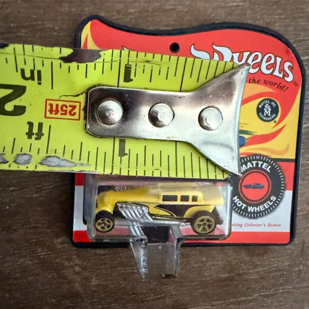 Hot Wheels Worlds Smallest Yellow Miniature Car Blister Pack with Button Mattel